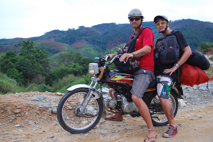 riding a 100 cc 4 strokes all of Vietnam, 2 crazy people on it